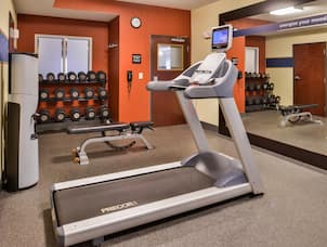 Fitness Center with Cardio Equipment and Weights