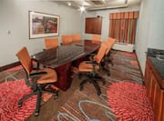 Boardroom with long table and chairs