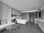 Camera attrezzata per ospiti con disabilità - Letto king size, divano, tavolino e TV a parete