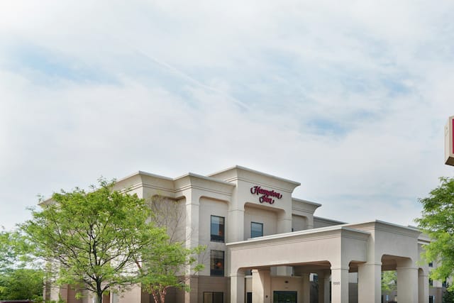 Hotel Exterior with Hampton Inn Logo