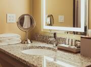Bathroom Vanity Area with Amenities