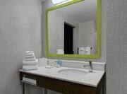 Bathroom with mirror and sink