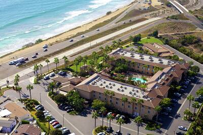 Aerial View of Hotel Exterior and Beach Front 
