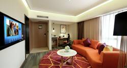 Business Suite with Living Area, Room Technology, and Coffee Table