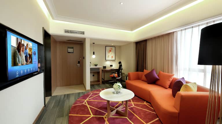 Business Suite with Living Area, Room Technology, and Coffee Table