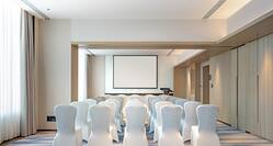 Meeting room with white chairs