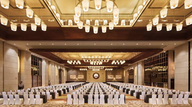 Large ballroom with classroom setup tables and chairs