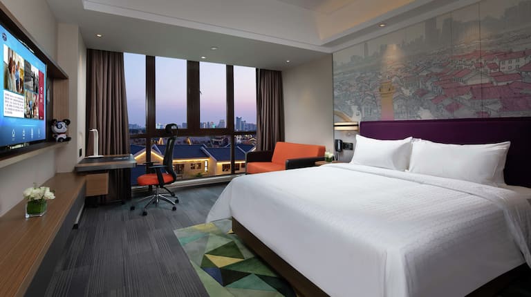 King Superior Guestroom with Bed, Lounge Area, Outside View, Work Desk, and Room Technology
