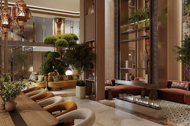 Coin détente du hall avec tables et cheminée