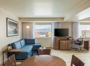 king suite with sofabed and TV