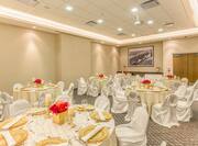 Ballroom Wedding Setup Roundtables and Chairs