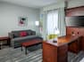 living area and work desk in guestroom