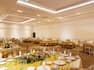 Elegant Banquet and Event Space with Dining Tables and Place Settings 