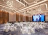 Spacious Ballroom Dining Area with Large Screen