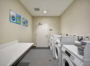 Guest Laundry with Coin Operated Washing Machines