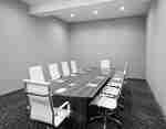 Meeting Room with Large Table and Office Chairs