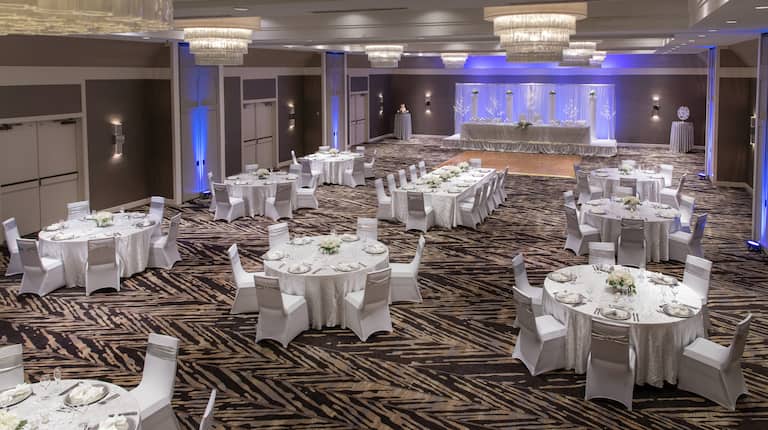 Large Space Setup with Round Tables for a Wedding