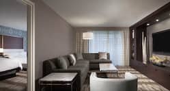 Suite with Lounge Area, Room Technology, and Two Beds