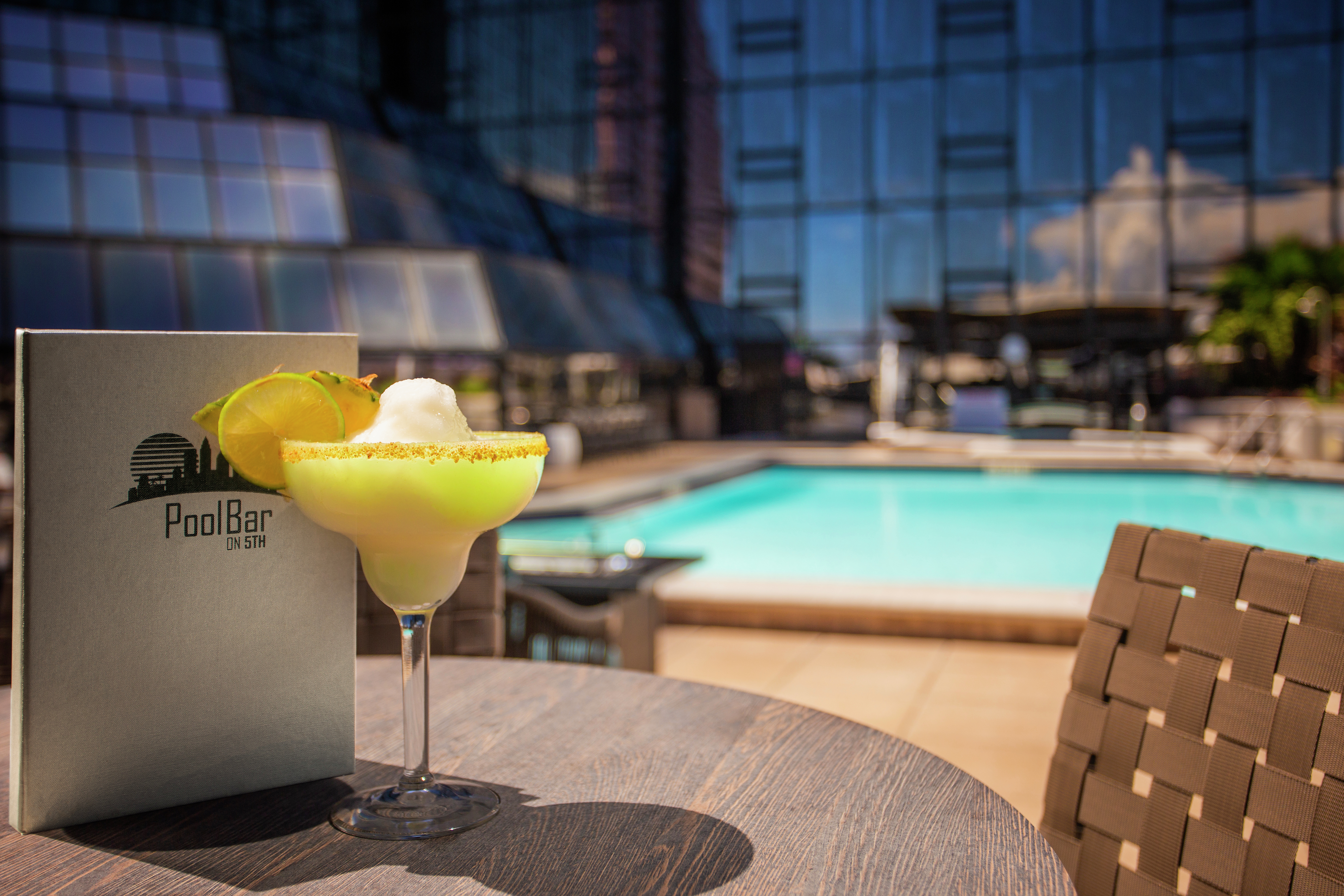 A Cocktail on a Table by the Pool