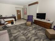 Two King Two Bedroom Suite Living Area with Lounge Area, Work Desk, Kitchenette, and Room Technology