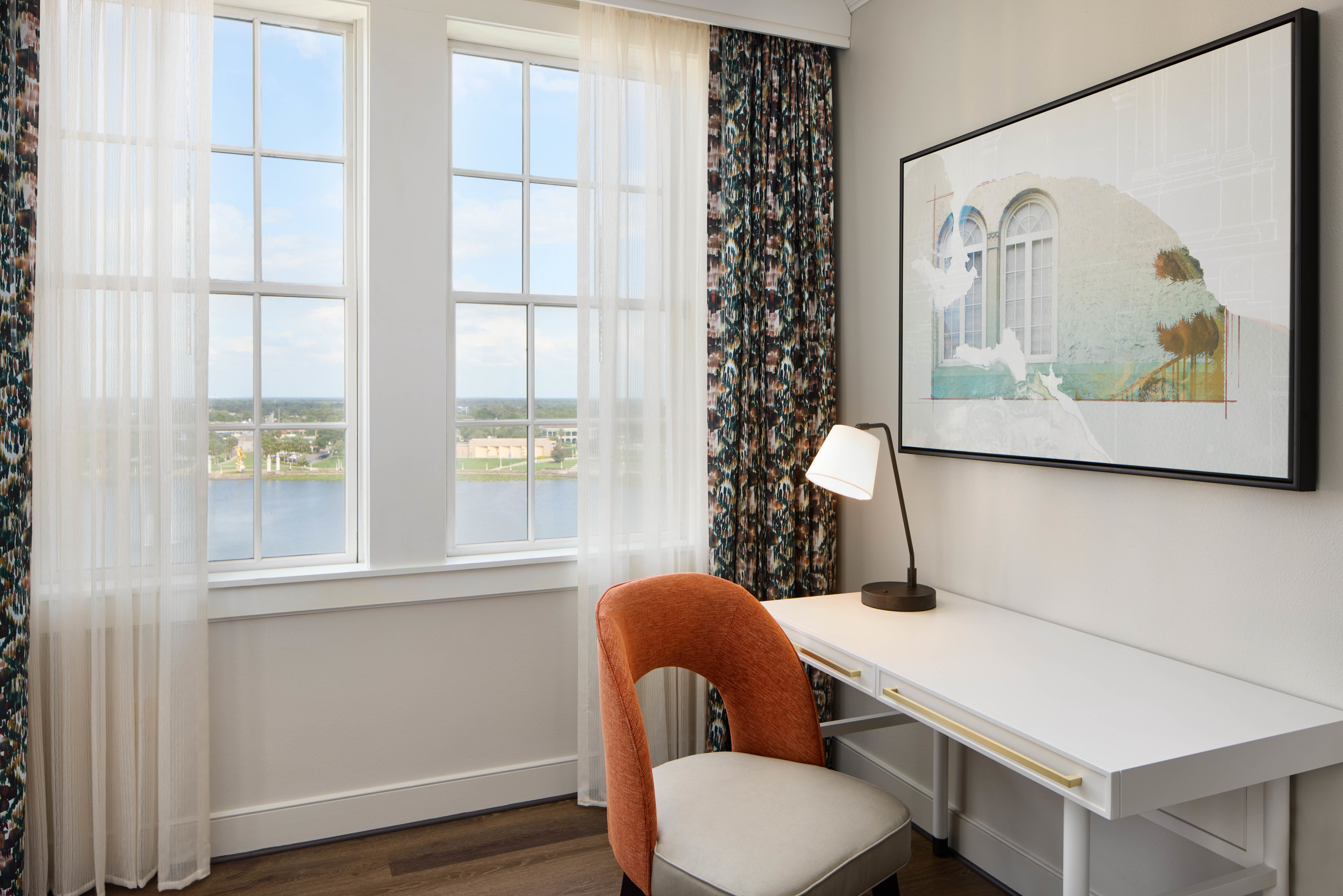 Desk Area in Guest Room with Lake View