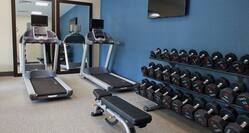 Fitness Center with weightbench and weights