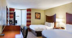 Non-Smoking Parlor Suite with Two Queen Beds, Lounge Area, Work Desk, and Room Technology