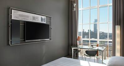 Suite with Work Desk and Wall-Mounted Television