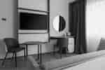 Suite Work Desk, Chairs, Small Tanle, TV, and Amenities