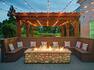 outdoor patio with fire pit at dusk