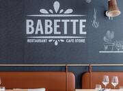 Babette Restaurant and Cafe Store Logo on a Wall 