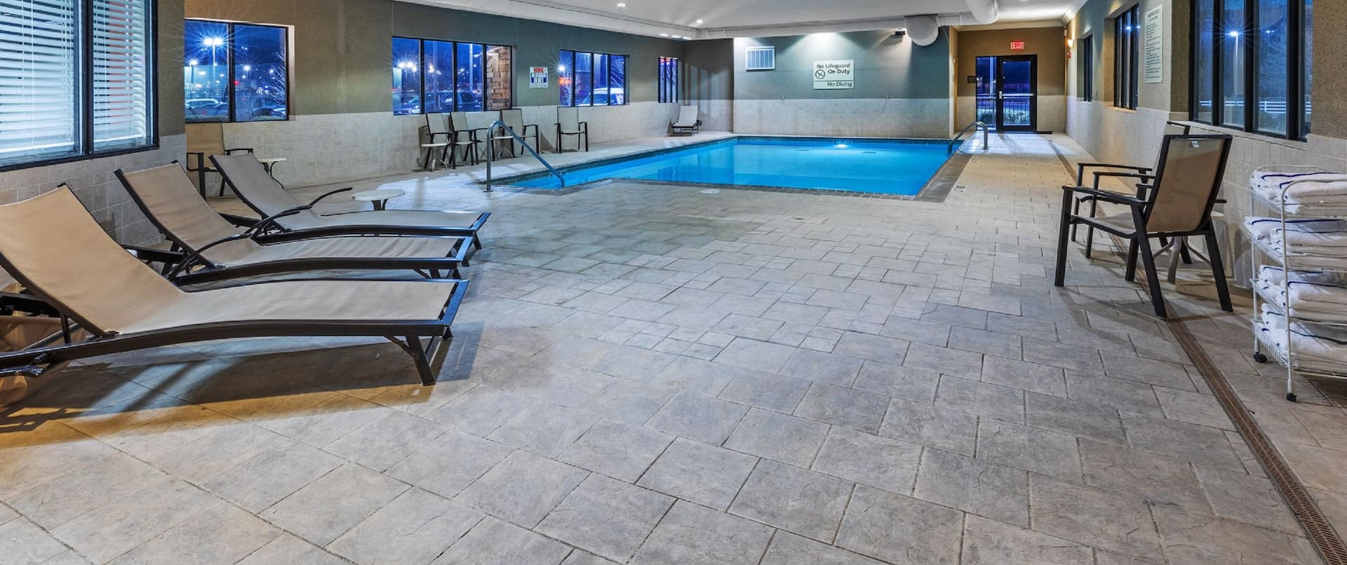Indoor Pool with Poolside Chairs