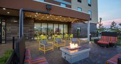 Outdoor Patio Area with Armchairs, Soft Seats and Firepit