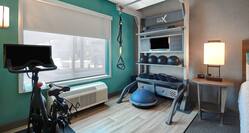 guest room with fitness equipment 