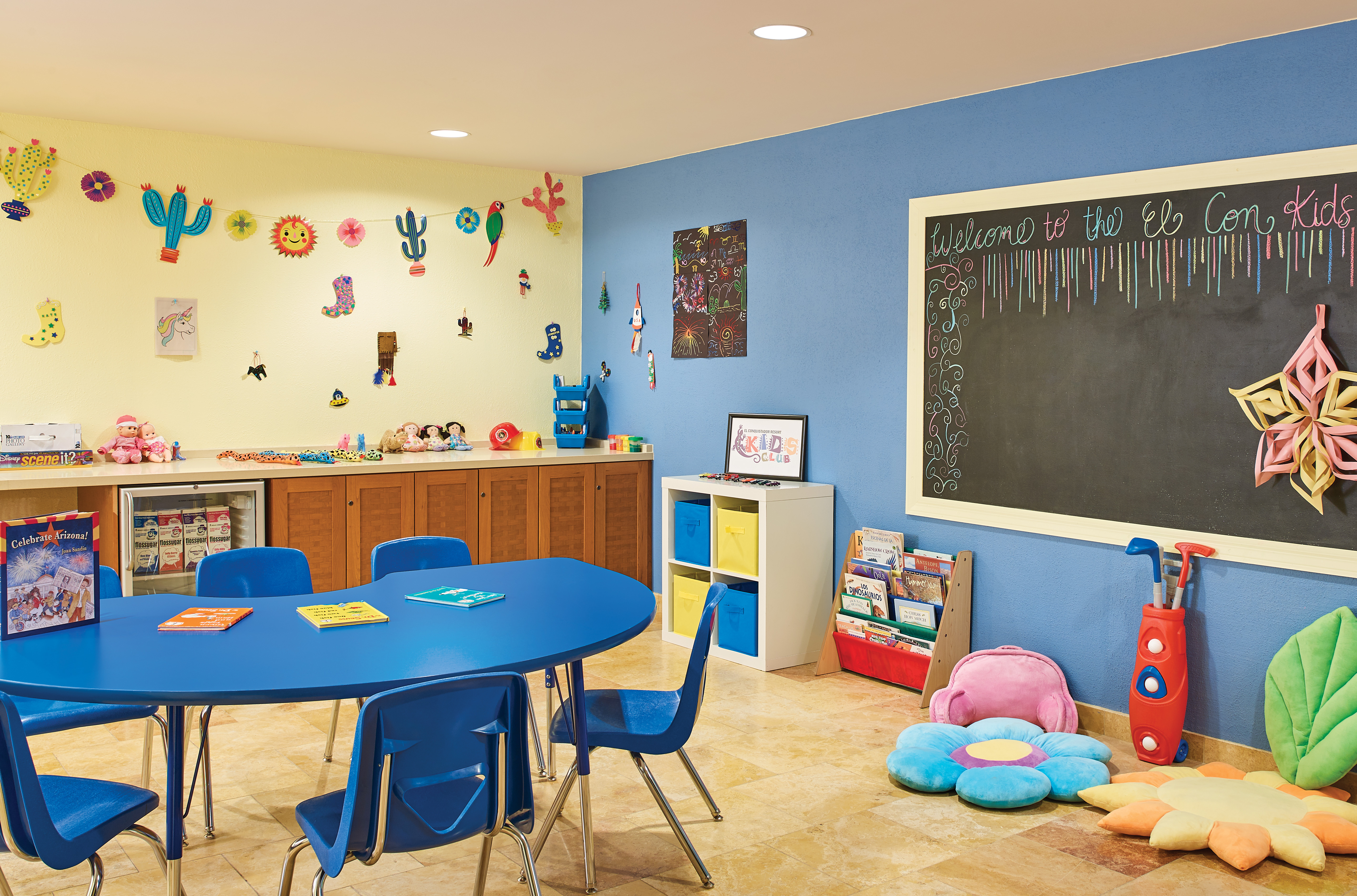 Kids Club Area With Chalkboard, Blue Teaching Table with Chairs, Cubbies, and Bookshelf