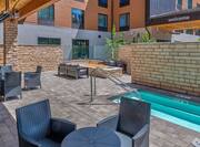 Outdoor Pool With Patio Seating