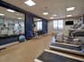 fitness center with machines and weights