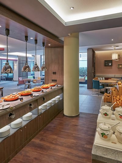 Breakfast Buffet Area with Food on Table