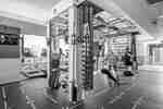 Four people exercising at fitness center