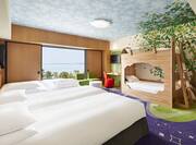 Family Happy Magic Ocean Room with Decorative Mural, Beds, TV, and Large Window