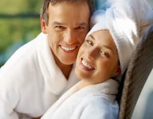 Couple Smiling in Spa Massage Robes