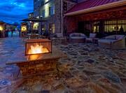 Outdoor Patio With Fire Pit At Night