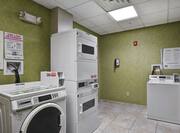 Coin-Operated Washers and Dryers in Guest Laundry Room