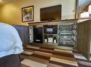 Guestroom Amenities Microwave Fridge and HDTV