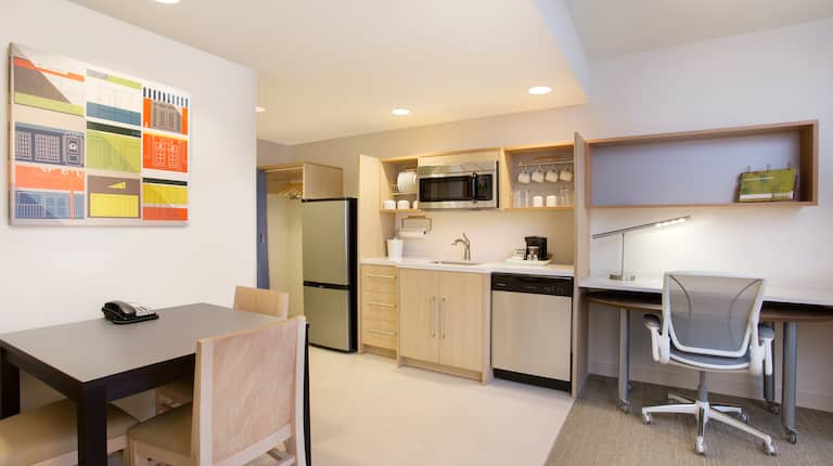 Guestroom Suite with Work Desk, Kitchen, Dishwasher, Microwave and Refridgerator