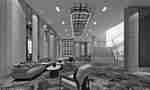 Prefunction area with seating and a grand staircase.