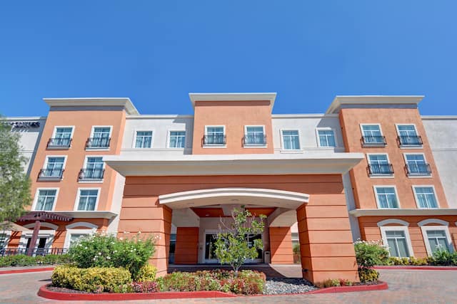 Front hotel exterior with covered circle drive for entrance