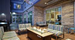 Night Time View of Outdoor Patio Seating and Firepit