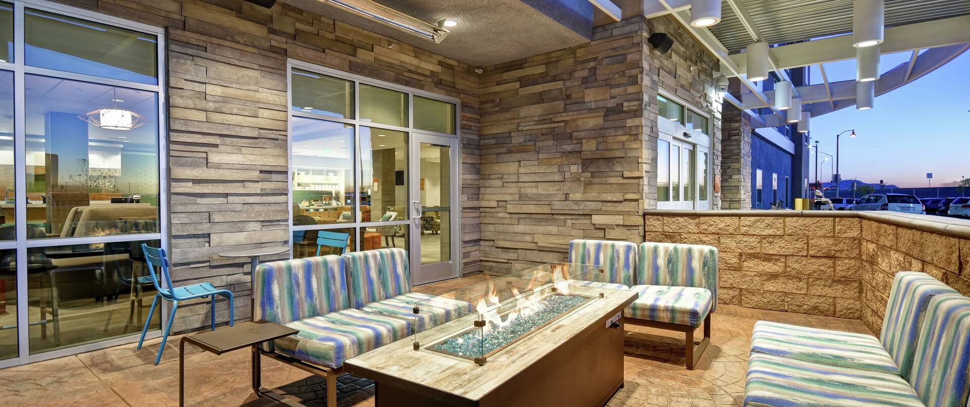 Outdoor Patio Seating and Firepit in Evening