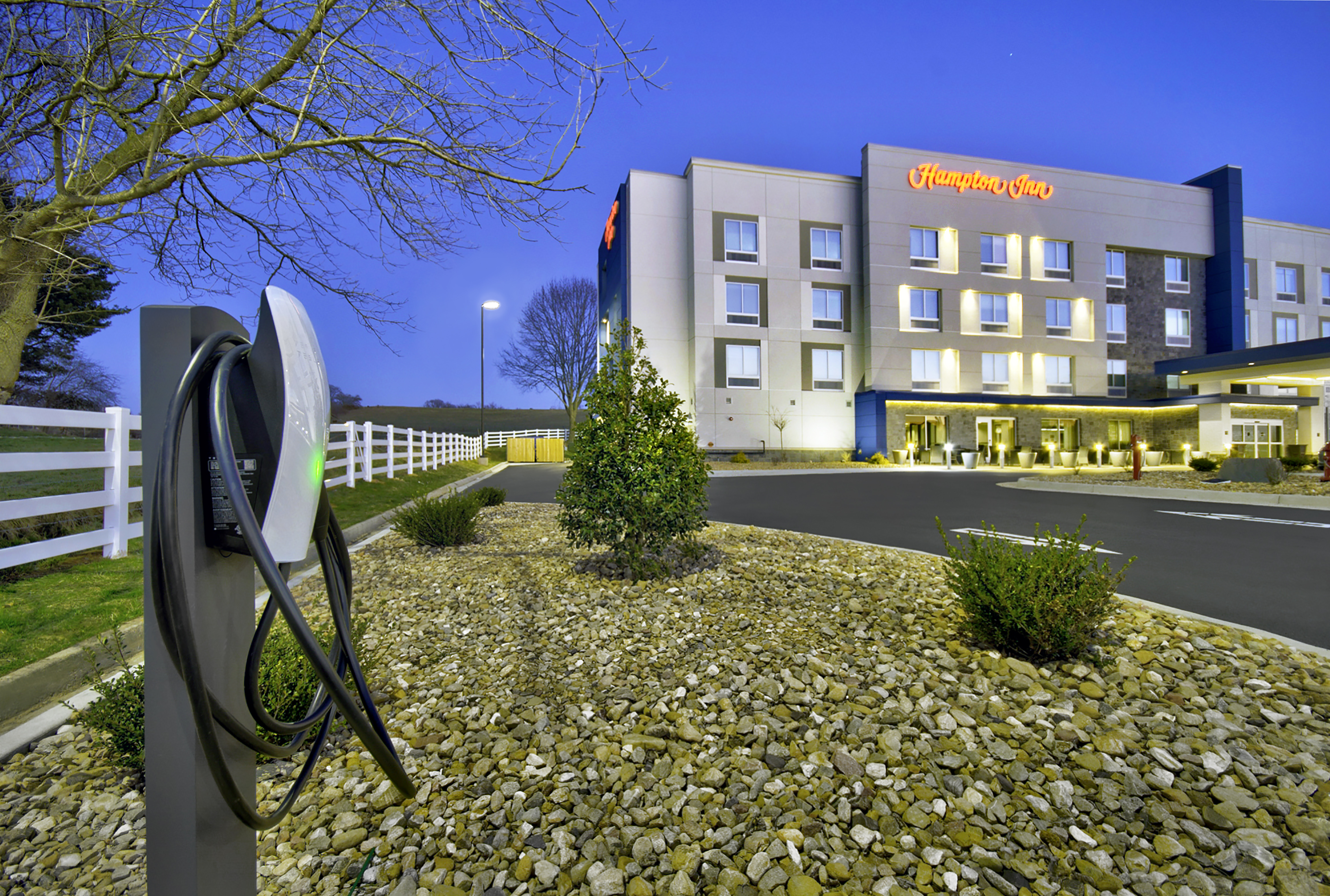 Hotel Exterior With Electric Vehicle Station